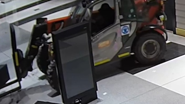 CCTV of a thief stealing an ATM inside Cameron Park Plaza using the forklift. Picture: NSW Police.