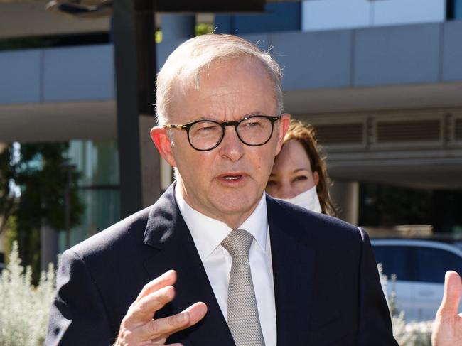 Federal Opposition Leader Anthony Albanese speaks to the media as WA Premier Mark McGowan looks on during a press conference at St. John of God Hospital in Perth, Wednesday, April 6, 2022. (AAP Image/Trevor Collens) NO ARCHIVING