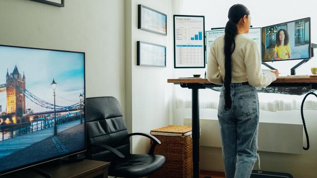 Woman working from home at standing desk