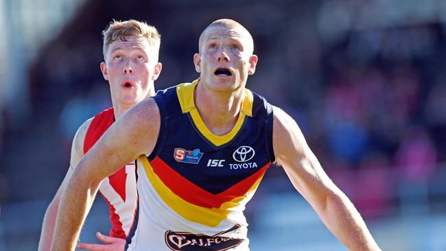 Barns gets set for a ruck battle against Adelaide’s Sam Jacobs. Picture: Tom Huntley