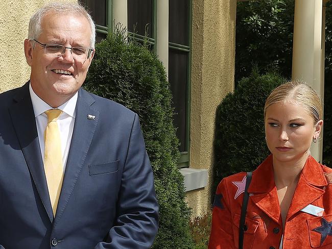 CANBERRA, AUSTRALIA NewsWire Photos JANUARY 25, 2022: Prime Minister Scott Morrison  with Grace Tame, who appeared to be uncomfortable with the meeting.The PM spoke with at the 2022 Australian of the Year Finalists Morning Tea, at the Lodge in Canberra.Picture: NCA NewsWire / Gary Ramage