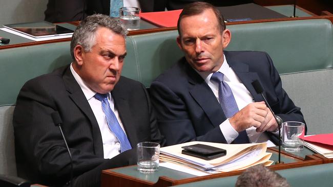 Joe Hockey and Tony Abbott sit on the backbench after losing their jobs.