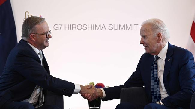 Joe Biden shakes hands with Anthony Albanese during a bilateral meeting as part of the G7 Leaders' Summit in Hiroshima.