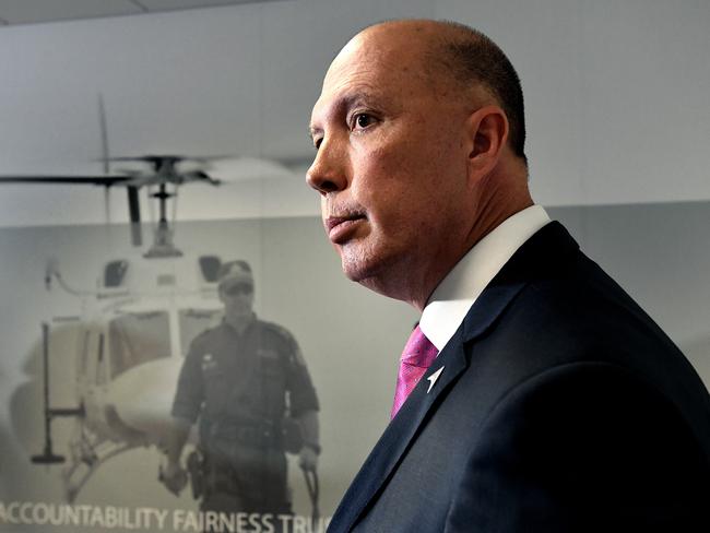 Federal Minister for Home Affairs Peter Dutton is seen during a press conference following the opening of the Australian Centre to Counter Child Exploitation (ACCCE) in Brisbane, Monday, September 3, 2018. (AAP Image/Dave Hunt) NO ARCHIVING