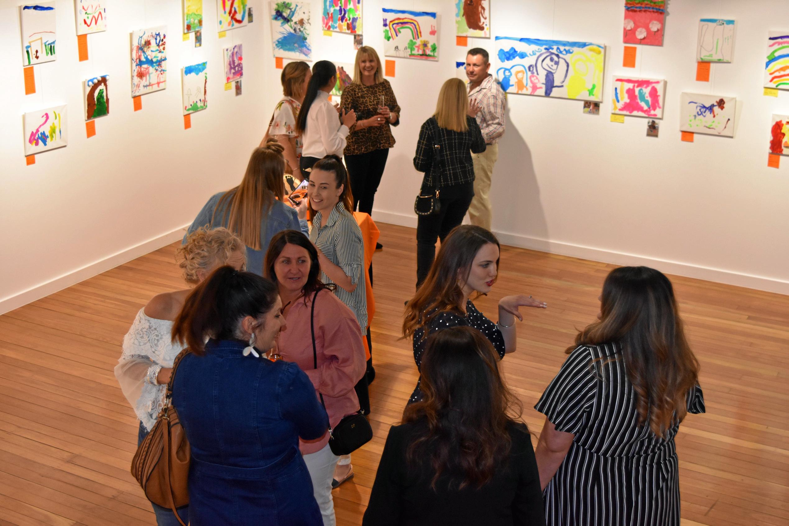 Guests looking around the 2019 KAOS exhibition. Picture: Shannon Hardy