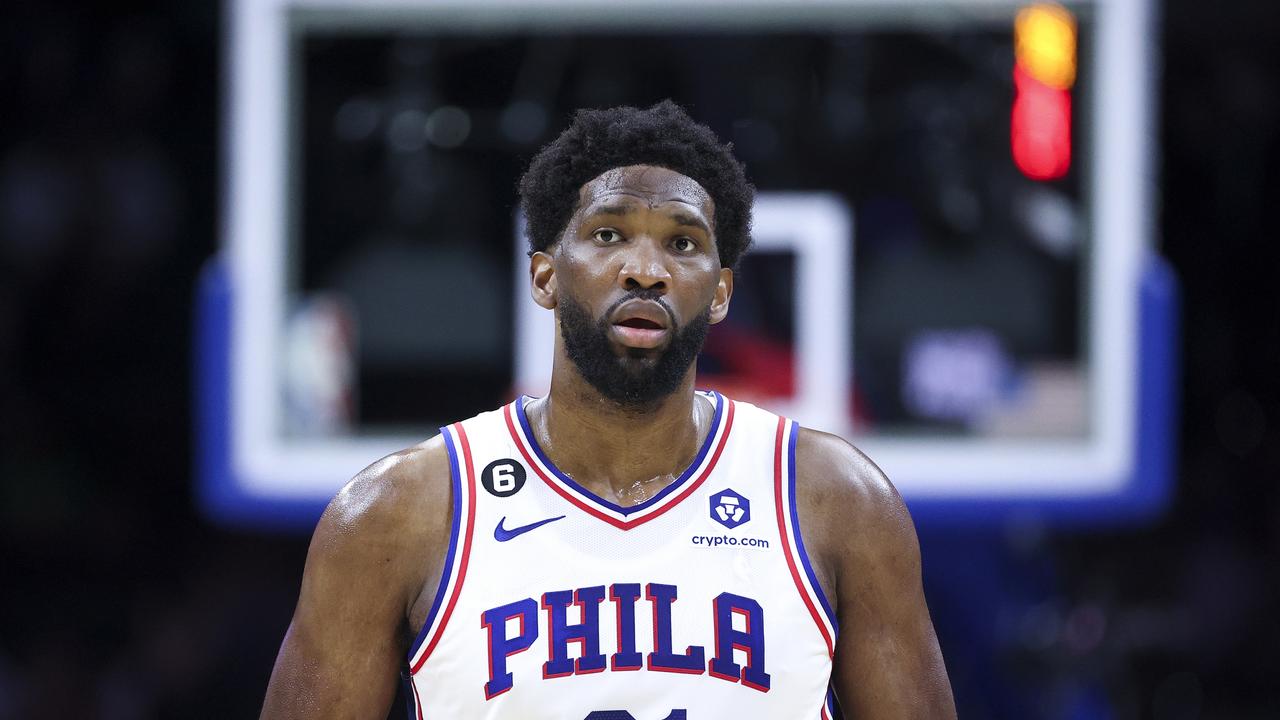 PHILADELPHIA, PENNSYLVANIA - OCTOBER 12: Joel Embiid #21 of the Philadelphia 76ers looks on during the first quarter against the Charlotte Hornets at Wells Fargo Center on October 12, 2022 in Philadelphia, Pennsylvania. NOTE TO USER: User expressly acknowledges and agrees that, by downloading and or using this photograph, User is consenting to the terms and conditions of the Getty Images License Agreement. (Photo by Tim Nwachukwu/Getty Images)