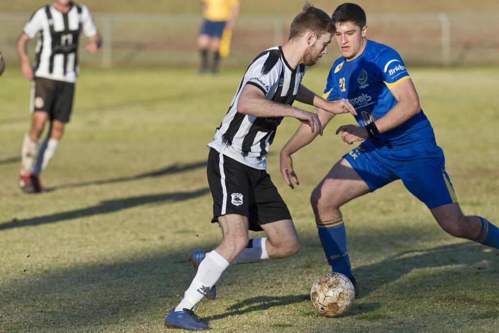 Brayden Thrupp (left) of Willowburn and Alex Dyball of USQ FC in Toowoomba Football League Premier Men semi-final at Commonwealth Oval, Sunday, August 26, 2018. Picture: Kevin Farmer