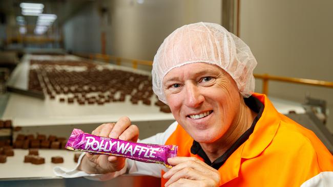 Robert Menz CEO Phil Sims with a Polly Waffle bar. Picture: Matt Turner