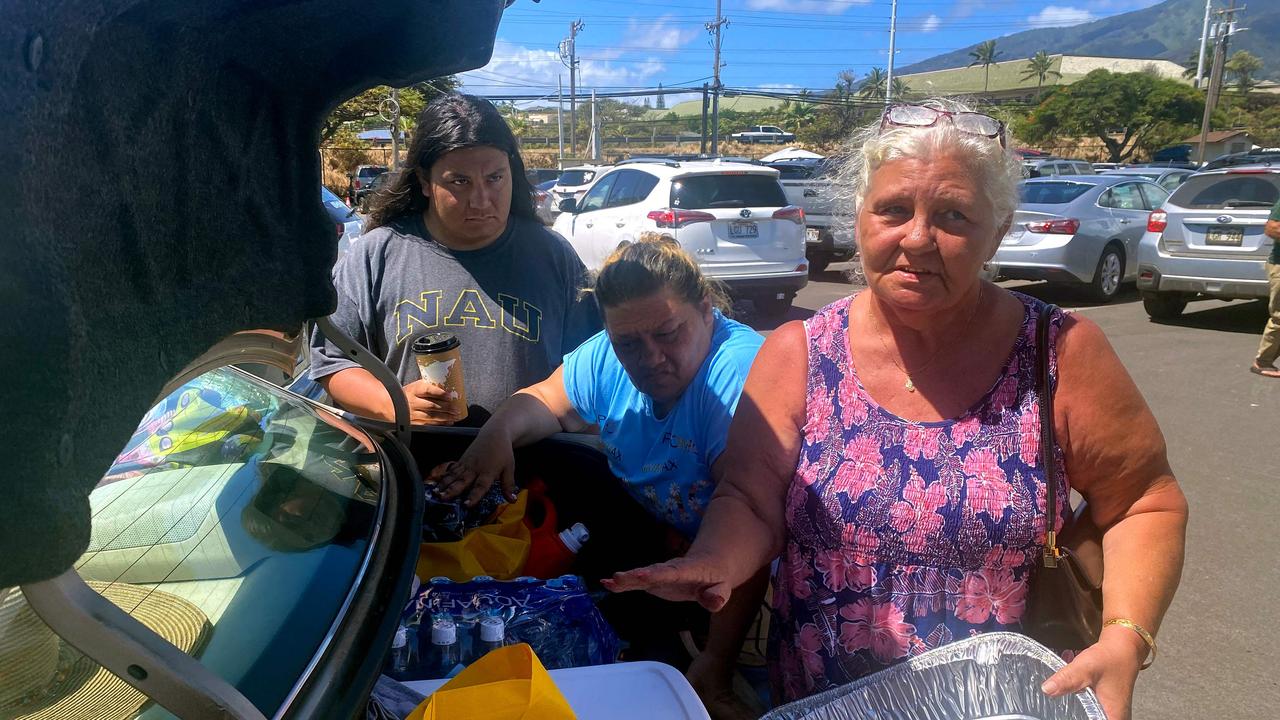 Vilma Reed, 63, said they only found out there was a fire when it was across the street from them. Picture: Paula Ramon / AFP