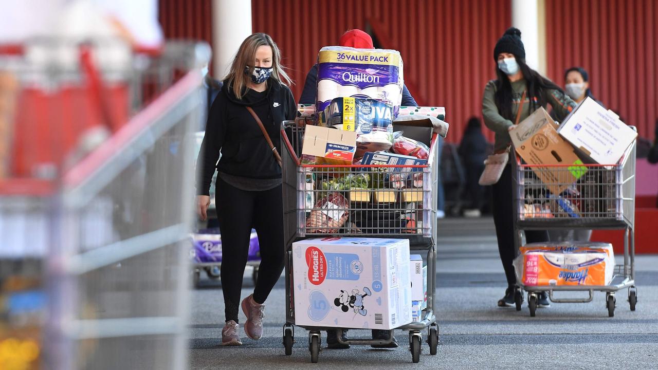 Shoppers stocked up ahead of the lockdown. Picture: William West/AFP.
