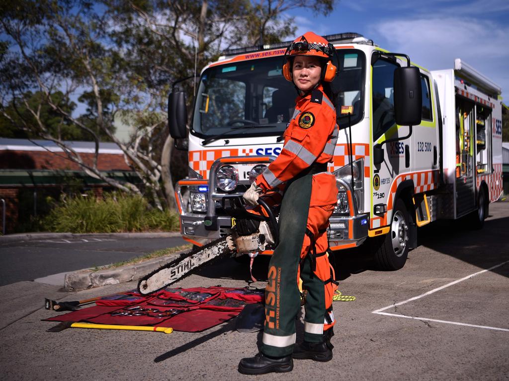 New South Wales state emergency services (SES) volunteer Michelle Whye in front of an emergency vehicle at their headquarters in Sydney. Picture: AFP