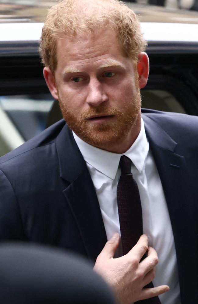 Harry is back in the UK to support his father. Picture: Henry Nicholls/AFP