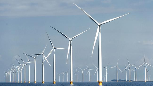 A picture taken on June 21, 2016 shows windmills at the new wind farm in Urk, The Netherlands.  The forty-eight wind turbines of the largest near-shore wind farm in the Netherlands generate an amount of renewable energy that is comparable to the consumption of 160,000 households.  / AFP PHOTO / ANP / Remko de Waal / Netherlands OUT