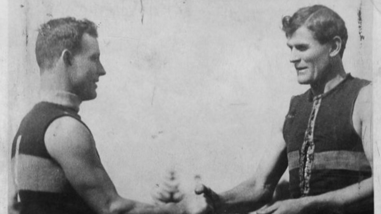 SA football - Bill Mayman and Tom Leahy, Sturt and North Adelaide captains, shake hands before the memorable challenge grand final of 1919.