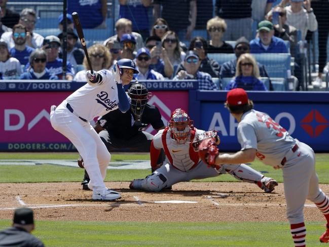 LOS ANGELES, CALIFORNIA - MARCH 28: Shohei Ohtani #17 of the Los Angeles Dodgers hits a double against pitcher Miles Mikolas #39 of the St. Louis Cardinals during the first inning on opening day at Dodger Stadium on March 28, 2024 in Los Angeles, California. (Photo by Kevork Djansezian/Getty Images)