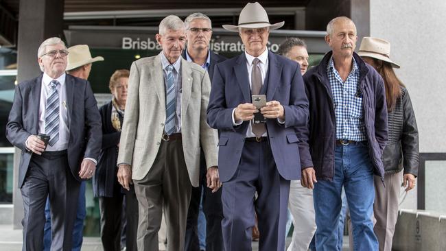 Federal MP Bob Katter is seen leaving the Brisbane Magistrate court with a group of farmers after attending Round 4 of the Royal Commission into Misconduct in the Banking, Superannuation and Financial Services Industry, Brisbane, Tuesday, June 26, 2018. (AAP Image/Glenn Hunt) NO ARCHIVING