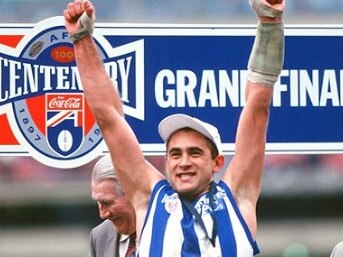 Wayne Schwass with his 1996 premiership medal. Picture: Twitter/Wayne Schwass