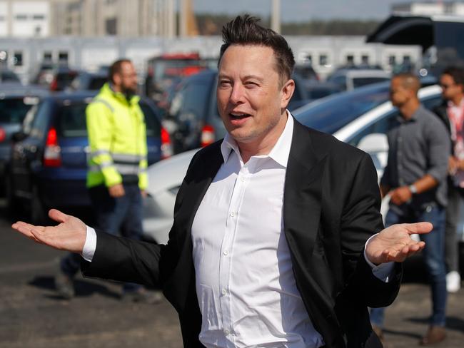 Tesla CEO Elon Musk gestures as he arrives to visit the construction site of the future US electric car giant Tesla, on September 03, 2020 in Gruenheide near Berlin. (Photo by Odd ANDERSEN / AFP)