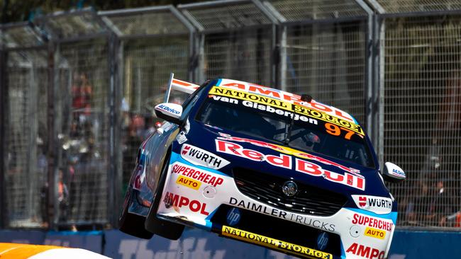 Shane van Gisbergen ends up on two wheels during the Gold Coast 500.