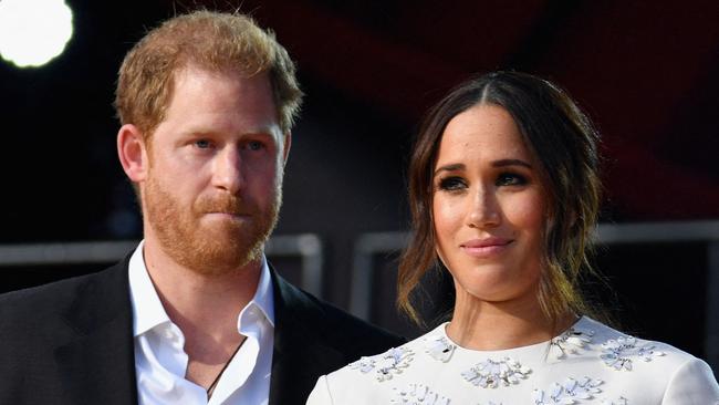 (FILES) Britain's Prince Harry and Meghan Markle speak during the 2021 Global Citizen Live festival at the Great Lawn, Central Park on September 25, 2021 in New York City. A multi-million-dollar deal between a media group run by Britain's Prince Harry and his wife Meghan Markle, and streaming giant Spotify is to end, a report said June 15, 2023. (Photo by Angela Weiss / AFP)