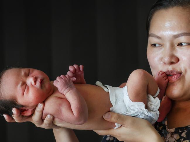 Mum Quyen Khajavee kisses newborn daughter Sahar Khajavee after a heel prick test at the Joan Kirner Women’s and Children’s at Sunshine Hospital. Picture: David Caird