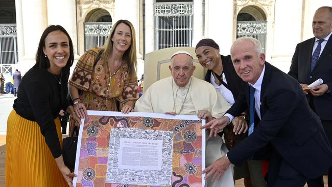 Pope Francis is presented with a copy of the Uluru Statement at the Vatican by (from left) Australian Ambassador to the Holy See Chiara Porro, Jacqui Remond, Theresa Ardler, and Professor Dermot Nestor. Picture: Vatican Media