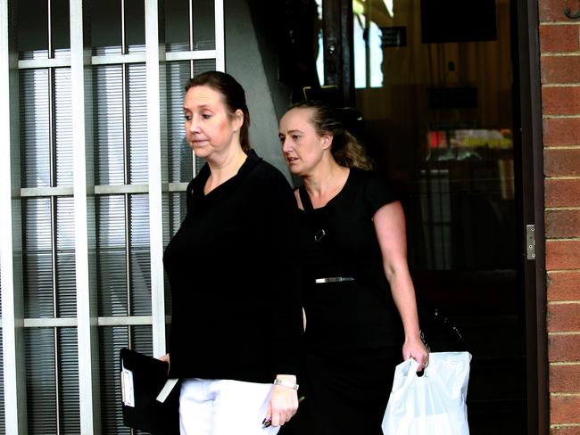 Inspectors leave Hiba Childcare Centre in Merrylands yesterday.