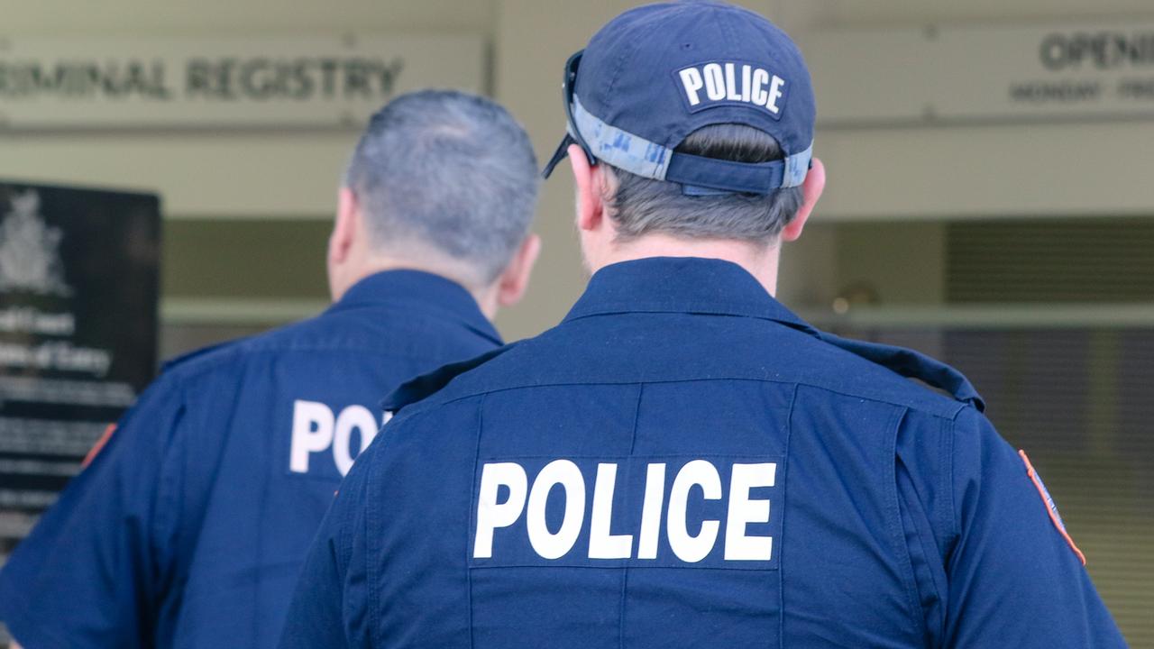 Laws making deliberately disarming a police officer an offence were one of many reforms pushed through Territory parliament in its first sittings of the year. Picture: Glenn Campbell