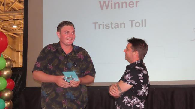 Tristan Toll receives the Rising Star Award from Councillor Sam Weston. Picture: Harry Brill.