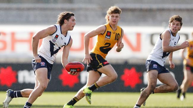 Mitch Szybkowski (left) looms as a draft slider. Picture: Dylan Burns/AFL Photos via Getty Images