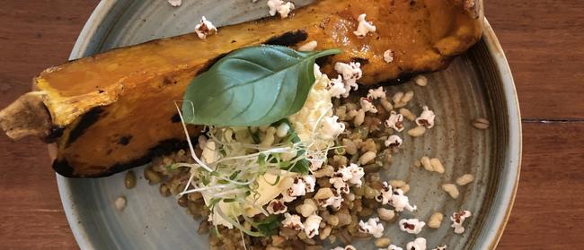 Roast pumpkin with toasted grains, popcorn, cultured cream and lovage at City Winery, Fortitude Valley.