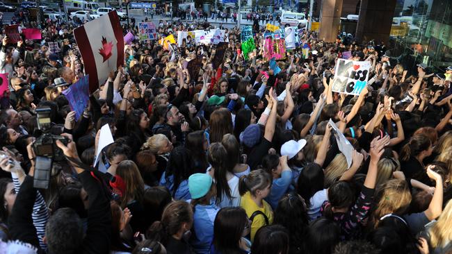 Bieber-mania in 2010 as thousands of fans — but not yours truly — hoped for a glimpse of the Canadian pop sensation during his performance on Sunrise in Sydney’s Martin Place. Picture: AAP