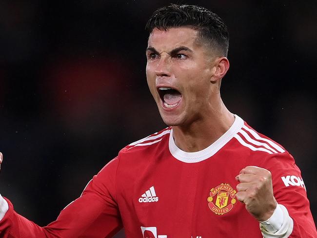 MANCHESTER, ENGLAND - SEPTEMBER 29: Cristiano Ronaldo of Manchester United celebrates their side's victory after the UEFA Champions League group F match between Manchester United and Villarreal CF at Old Trafford on September 29, 2021 in Manchester, England. (Photo by Laurence Griffiths/Getty Images)