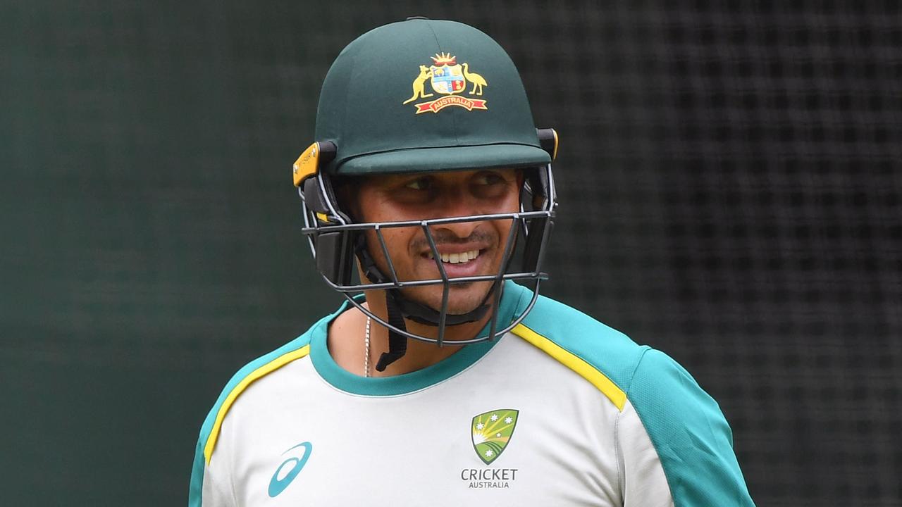 Australian cricketer Usman Khawaja prepares to bat during their final practice session at the Melbourne Cricket Ground (MCG) in Melbourne on February 25, 2022, before their departure for the team's first tour of Pakistan since 1998. (Photo by William WEST / AFP) / --IMAGE RESTRICTED TO EDITORIAL USE - NO COMMERCIAL USE--