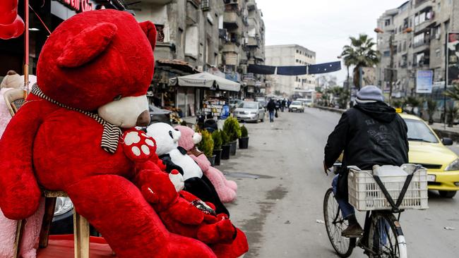 Love is in the air this month. (Photo by LOUAI BESHARA / AFP)