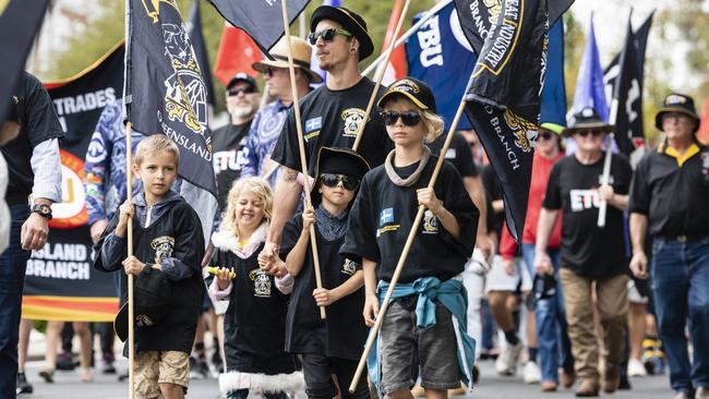 Marching with the AMIEU members are (from left) Jonah, Makenna, Daniel, Isaiah and Kayden Clarke at the Toowoomba Labour Day march, Saturday, April 29, 2023. Picture: Kevin Farmer