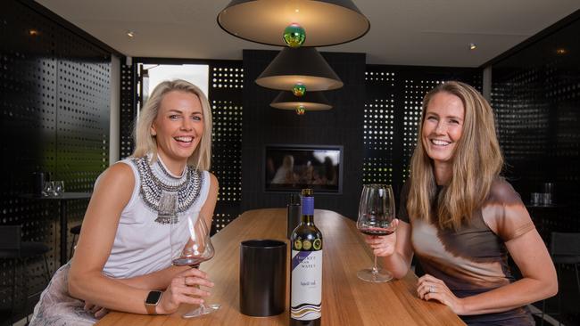 Emilie Greer and Jess Van Berlo taste wine at the new Thicker Than Water cellar door in McLaren Vale. Picture: Ben Clark