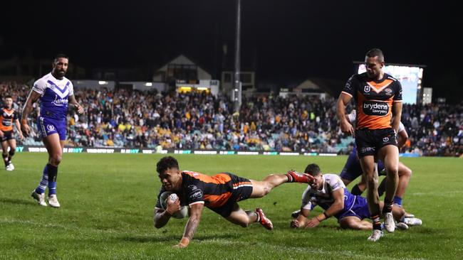 Starford To’a scored one of four first-half tries for the Tigers against the Bulldogs. Picture: Jason McCawley/Getty Images