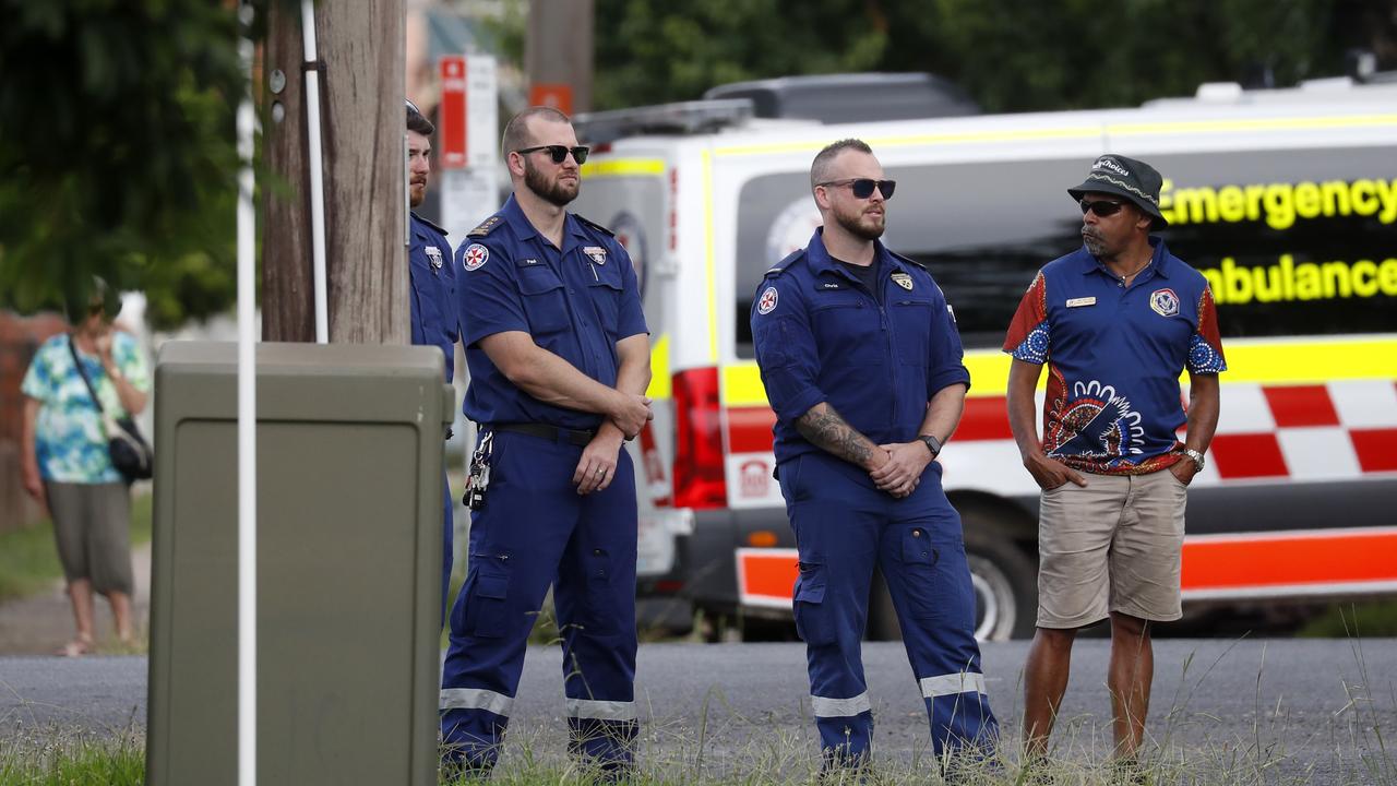 Paramedics at the scene. Picture: Jonathan Ng