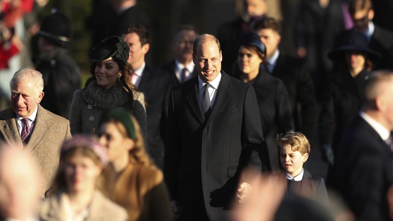 Britain's Prince William, centre, and Kate, Duchess of Cambridge, centre left, arrive with their son Prince George to attend the Christmas day service at St Mary Magdalene Church in Sandringham in Norfolk, England. Picture: AP/Jon Super