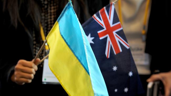 The flags of Ukraine and Australia