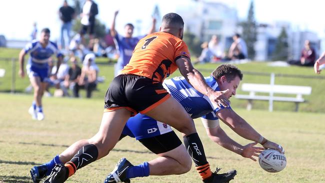 Tugun Seahawks (blue) vs. Southport Tigers at Tugun. Reserve Grade. Kurt Lawrence scoring a try. 6 June 2021 Tugun Picture by Richard Gosling