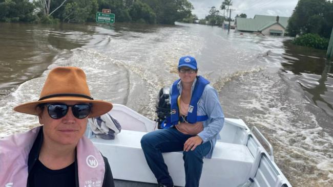 Bali Bombing survivor Hanabeth Luke in a tinnie with skipper Kira Hartland in Woodburn in NSW’s Northern Rivers during the floods in early 2022. Picture: Supplied.