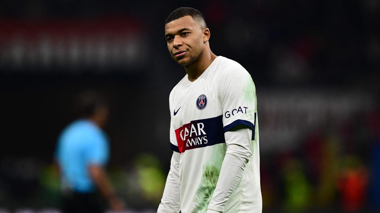 TOPSHOT – Paris Saint-Germain's French forward #07 Kylian Mbappe reacts during the UEFA Champions League 1st round group F football match between AC Milan and Paris Saint-Germain at the San Siro stadium in Milan on November 7, 2023. (Photo by Marco BERTORELLO / AFP)