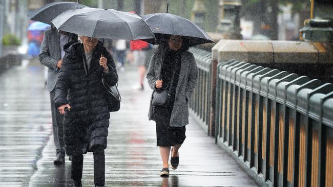 Rain lashes Melbourne on Friday. Picture: Andrew Henshaw