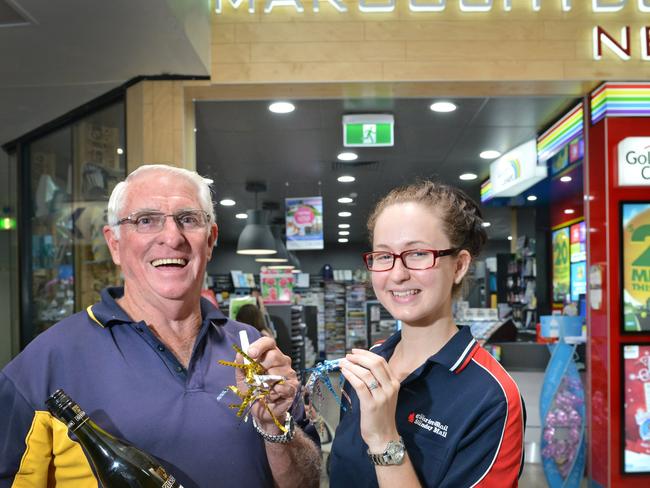 Maroochydore News owner Ian Busch and assistant Danica Warren at the Big Top Shopping Centre where he celebrated 27 years of business. Picture: Patrick Woods