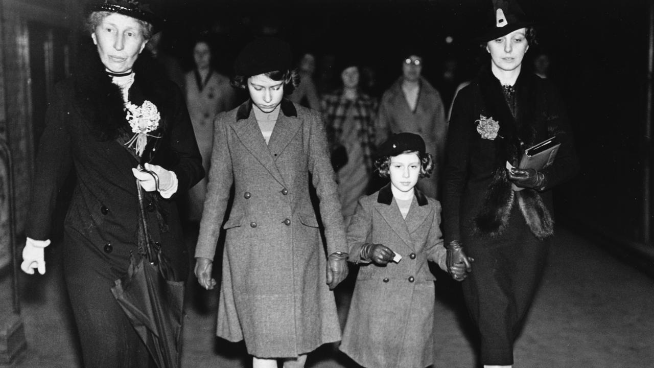 Princesses Elizabeth and Margaret are accompanied by Lady Helen Graham (left) and governess Marion Kirk Crawford in May 1939. Picture: Photo by Central Press/Hulton Archive/Getty Images.