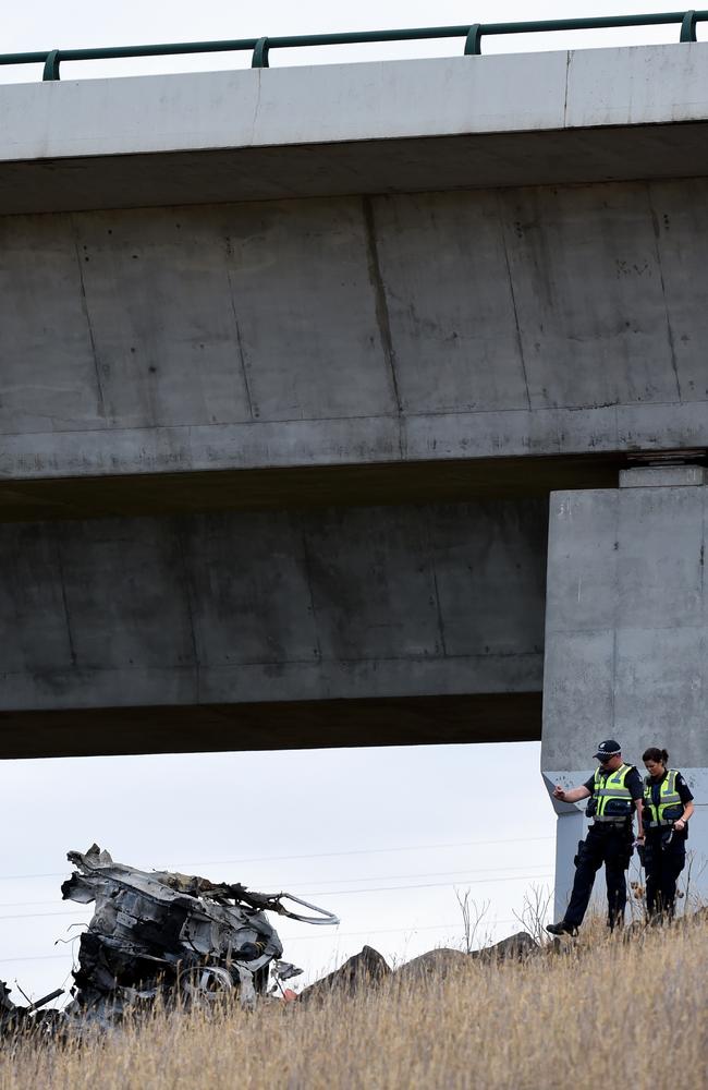 The remains of the car down the embankment. Picture: Nicole Garmston