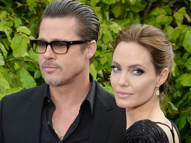 Angelina Jolie and Brad Pitt attend the screening of 