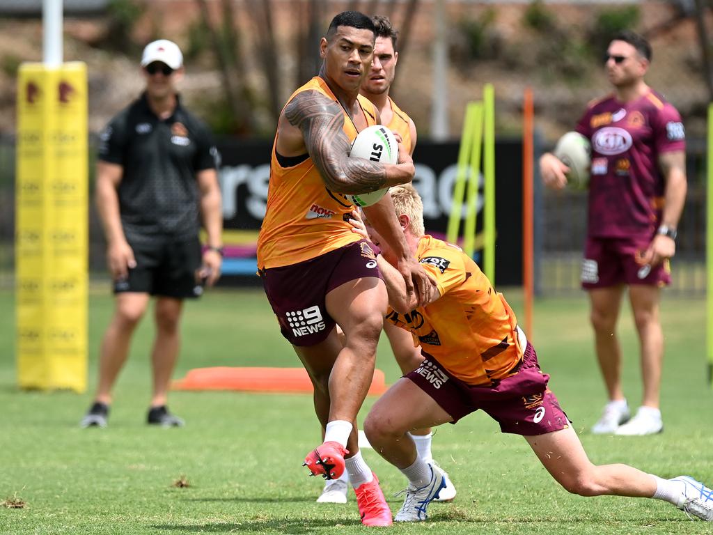 Jamayne Isaako breaks through the defence during a Brisbane Broncos NRL training session. Picture: Bradley Kanaris/Getty Images